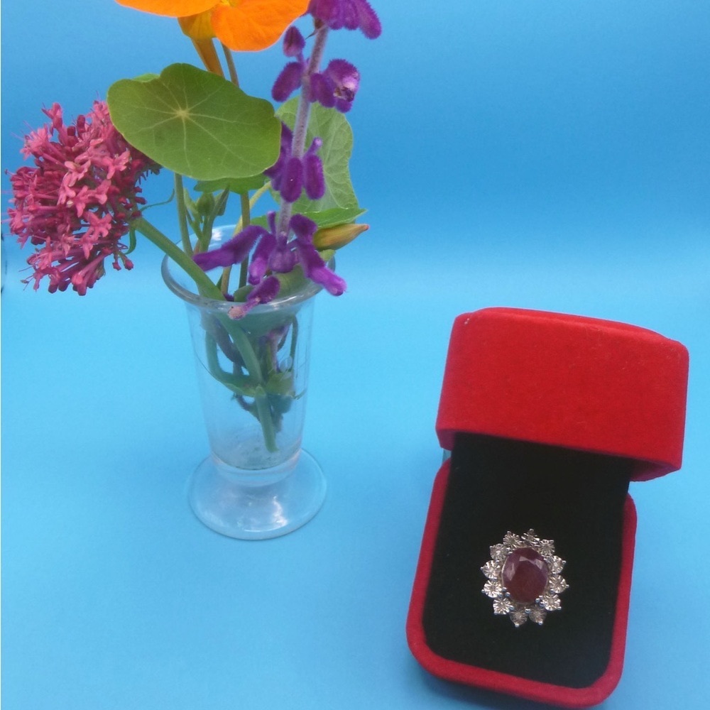4.95 ctw genuine oval Indian Ruby with 0.10 ctw round white Diamond
